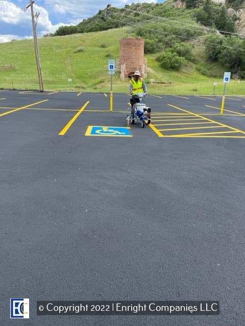 Parking lot lines being painted in Golden.