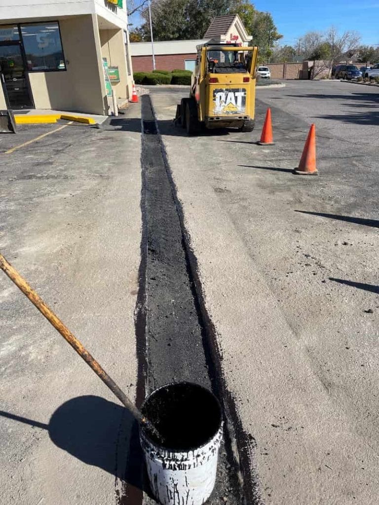 Utility Cut in asphalt being repaired