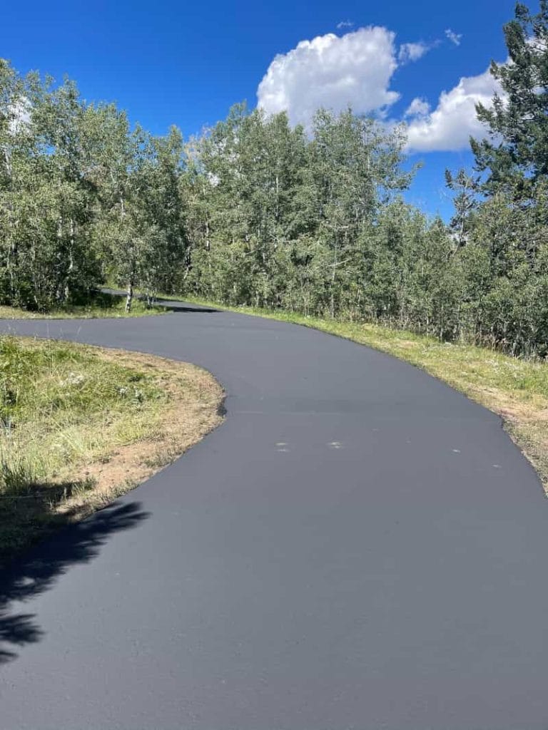 Driveway with sealcoating that has fully cured