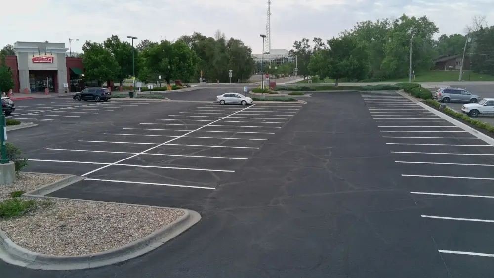 Parking lot with new sealcoating and striping