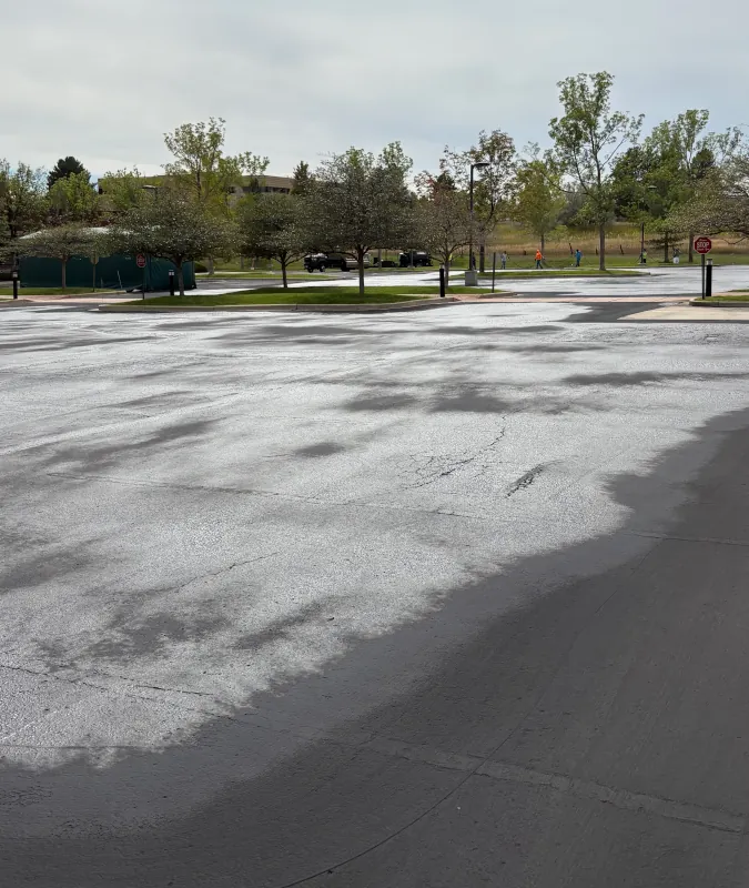 wet sealcoating on parking lot